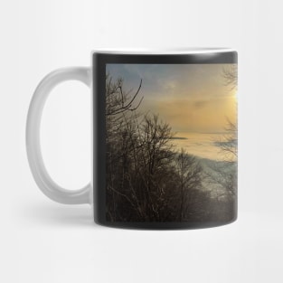 View from the top of a mountain at sunset Mug